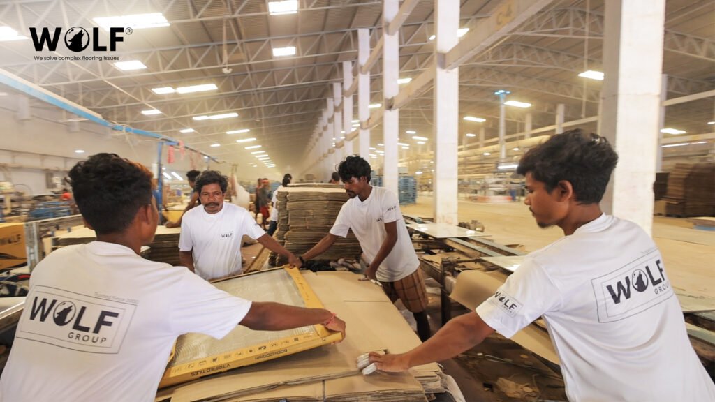Workers packing porcelain tiles at a Wolf factory in Morbi, Gujarat, India for export